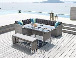 Ensemble de coin de jardin extérieur en rotin gris avec canapé, table à manger et banc de terrasse