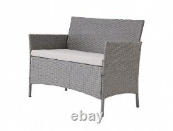 Ensemble de jardin en rotin gris : chaises, table et coussins pour extérieur, véranda ou patio