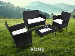 Ensemble de meubles de jardin en rotin comprenant 4 pièces : chaises, table et canapé pour patio extérieur.